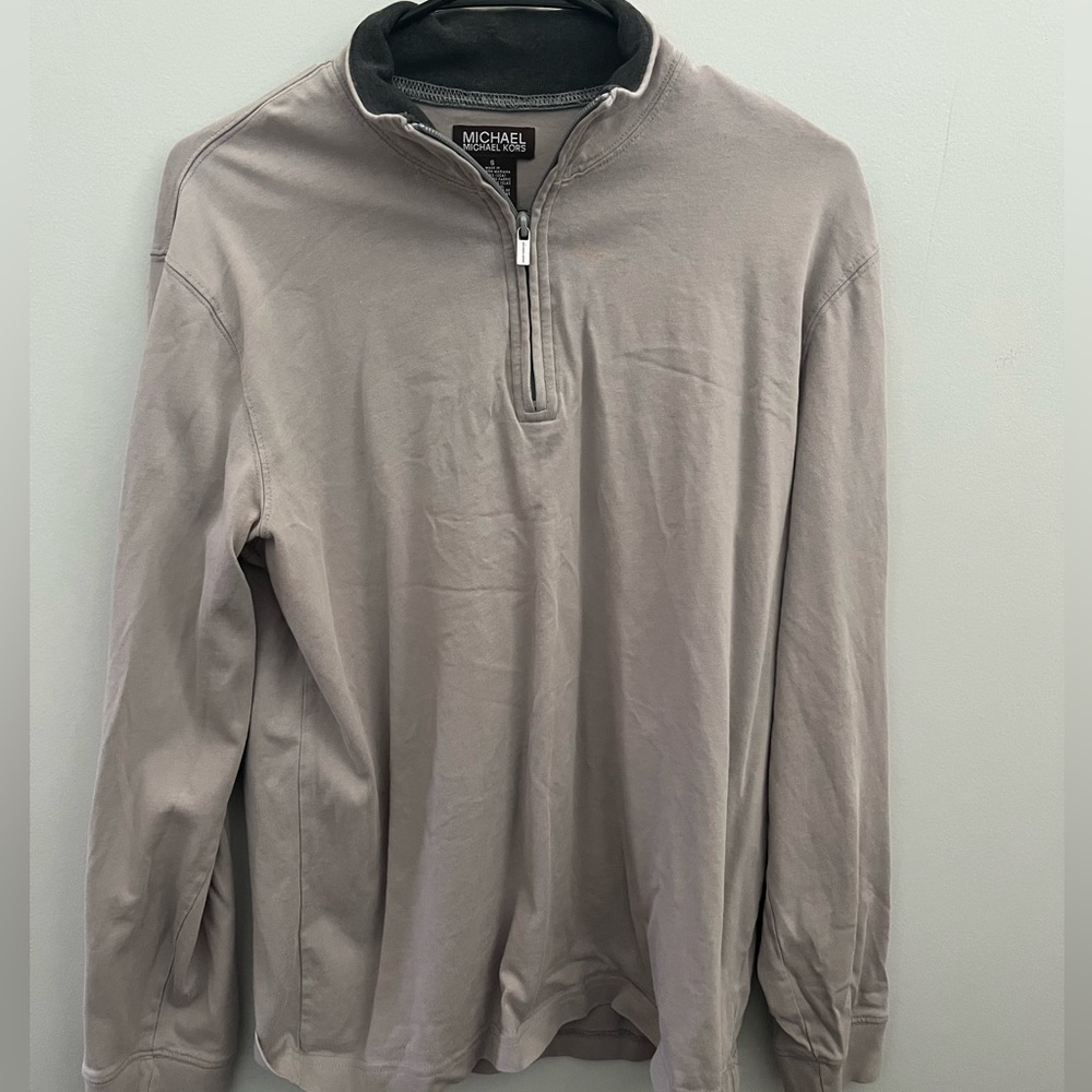 small cream color shirt